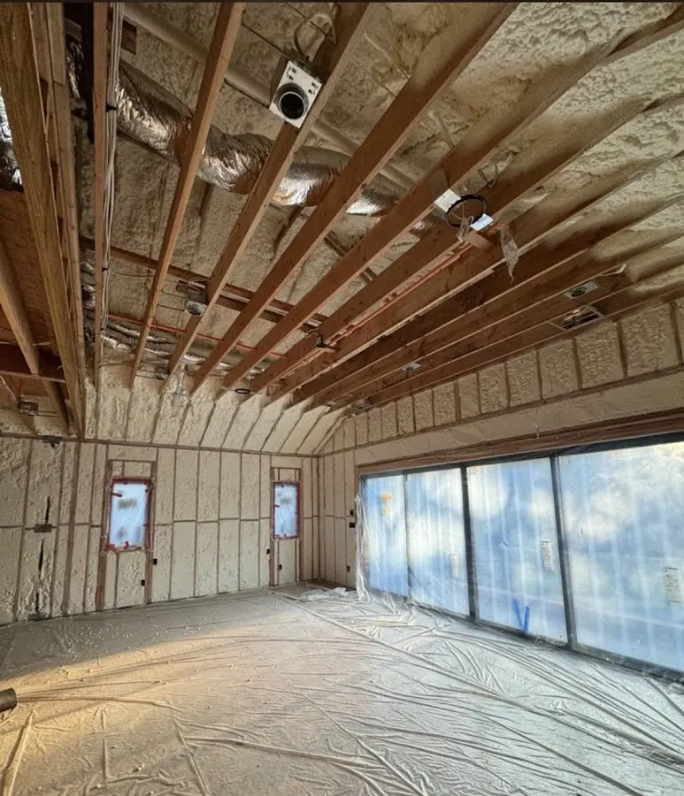 Interior walls and ceiling insulated with spray foam during new construction in Wesley Chapel